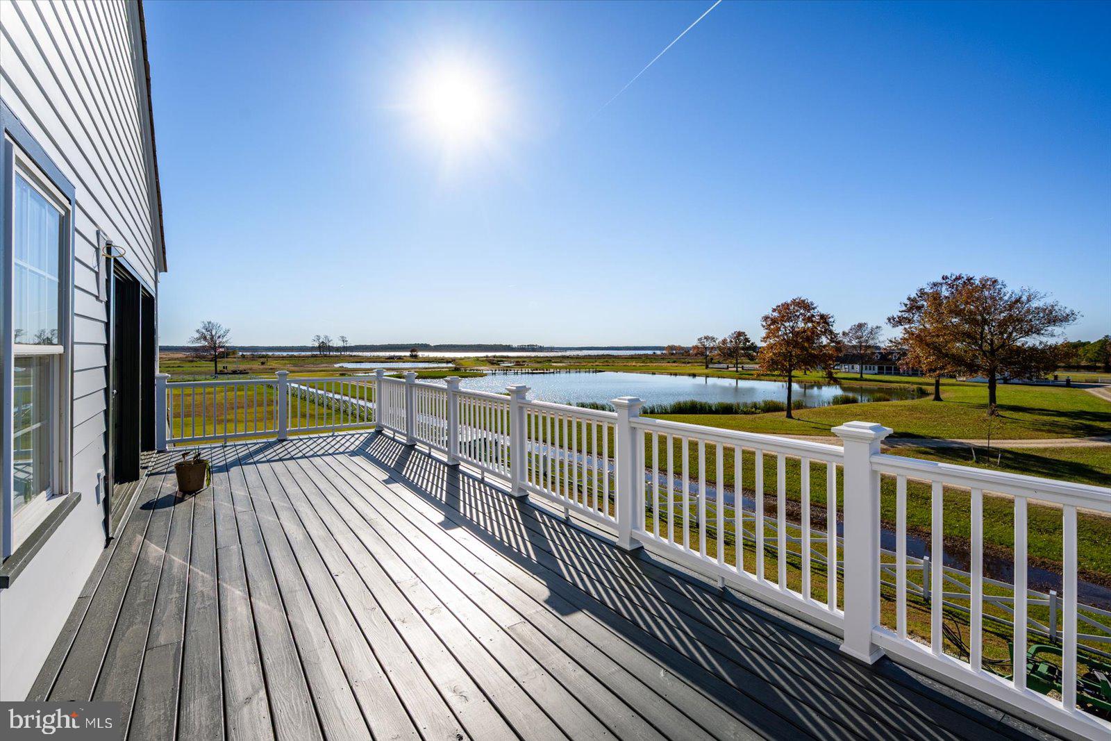 964 Taylors Island Road Madison, MD 21648 - Photo 61 of 106 a view of balcony with wooden floor and outdoor space