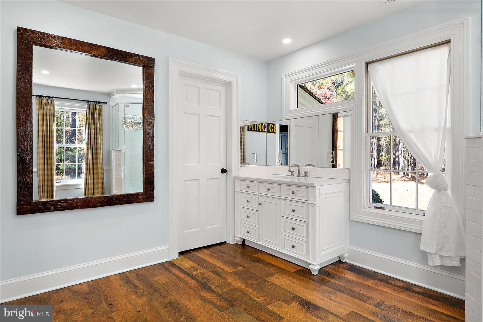 964 Taylors Island Road Madison, MD 21648 - Photo 86 of 106 First floor primary w/ensuite & custom built-ins