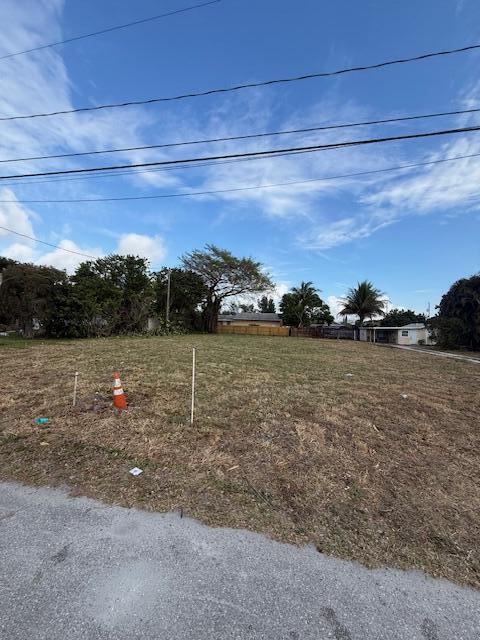 4583 Diekhans Road West Palm Beach, FL 33417 - Photo 2 of 6 a view of lake with mountain in background