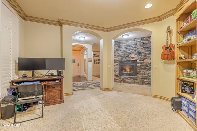 a kitchen with stainless steel appliances granite countertop a stove and a wooden floors