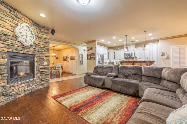 a bedroom with a bed and a cabinet
