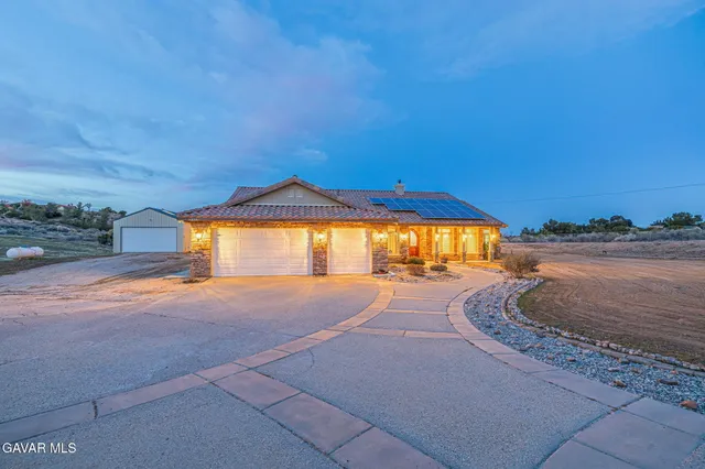 a view of a swimming pool with an ocean view