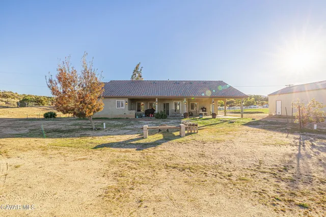 a view of balcony with wooden floor