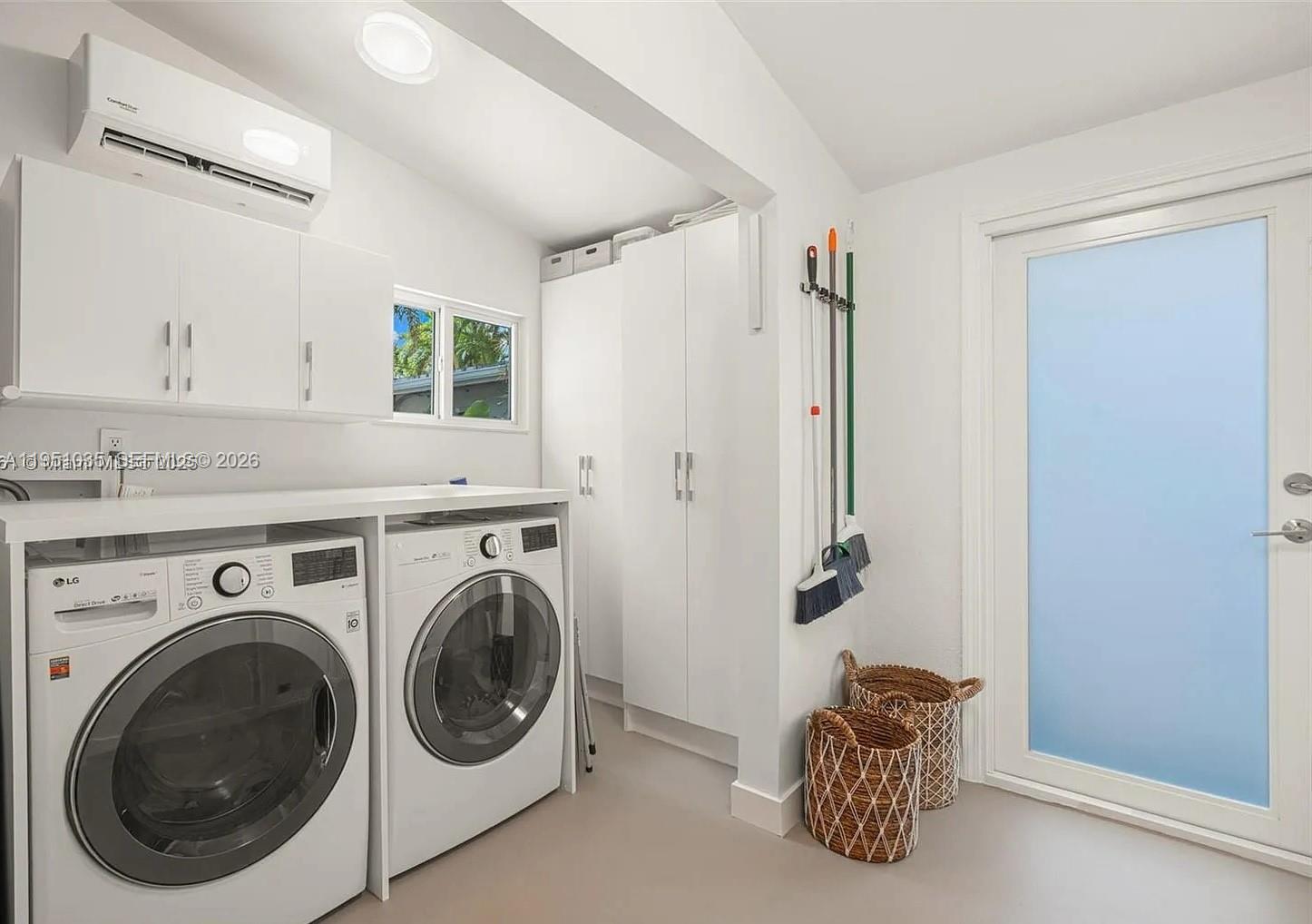 1040 Northeast 85th Street Miami, FL 33138 - Photo 21 of 22 a utility room with dryer and washer