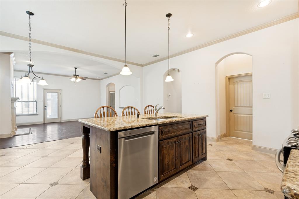 511 Mimosa Trail Forney, TX 75126 - Photo 9 of 30 Decorative Pendants over the Breakfast Bar
