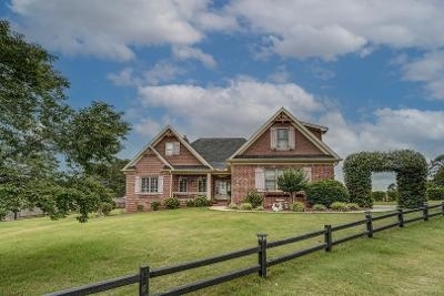 2620 Ho Hum Hollow Road Monroe, GA 30655 - Photo 1 of 1 a front view of a house with a yard