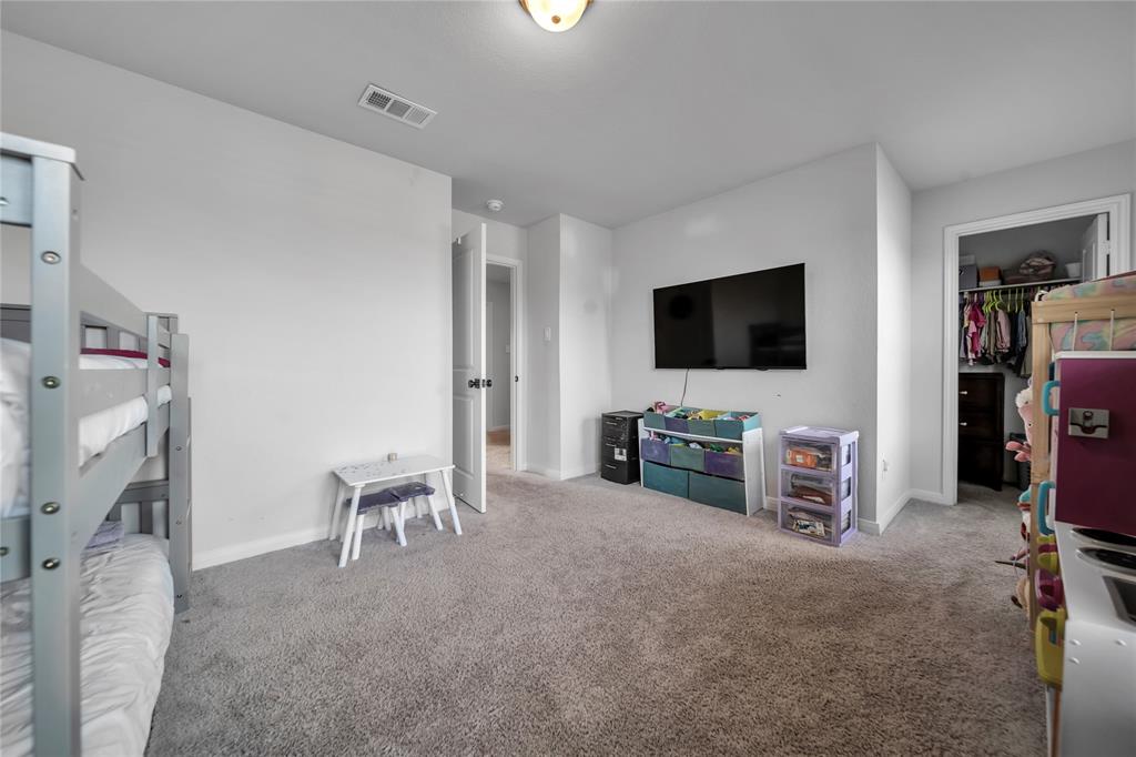3581 Chestnut Oak Drive Dallas, TX 75253 - Photo 16 of 21 a view of a livingroom with furniture and a flat screen tv