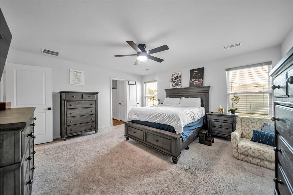 3581 Chestnut Oak Drive Dallas, TX 75253 - Photo 10 of 21 a bed room with a bed and a television