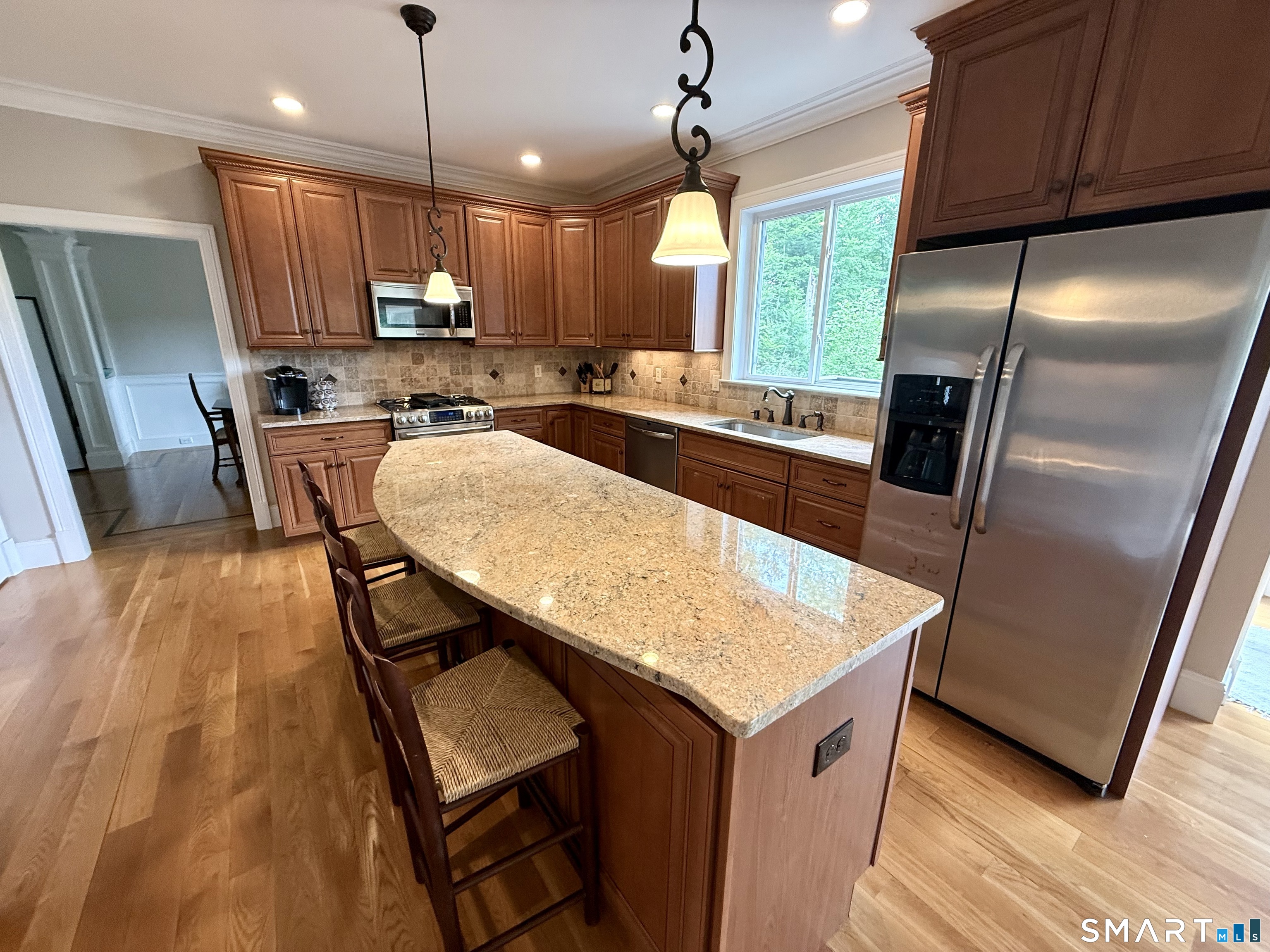 46 Hoseye Coach Road Newtown, CT 06482 - Photo 2 of 36 Beautiful kitchen with granite counters and tumbled marble back splash