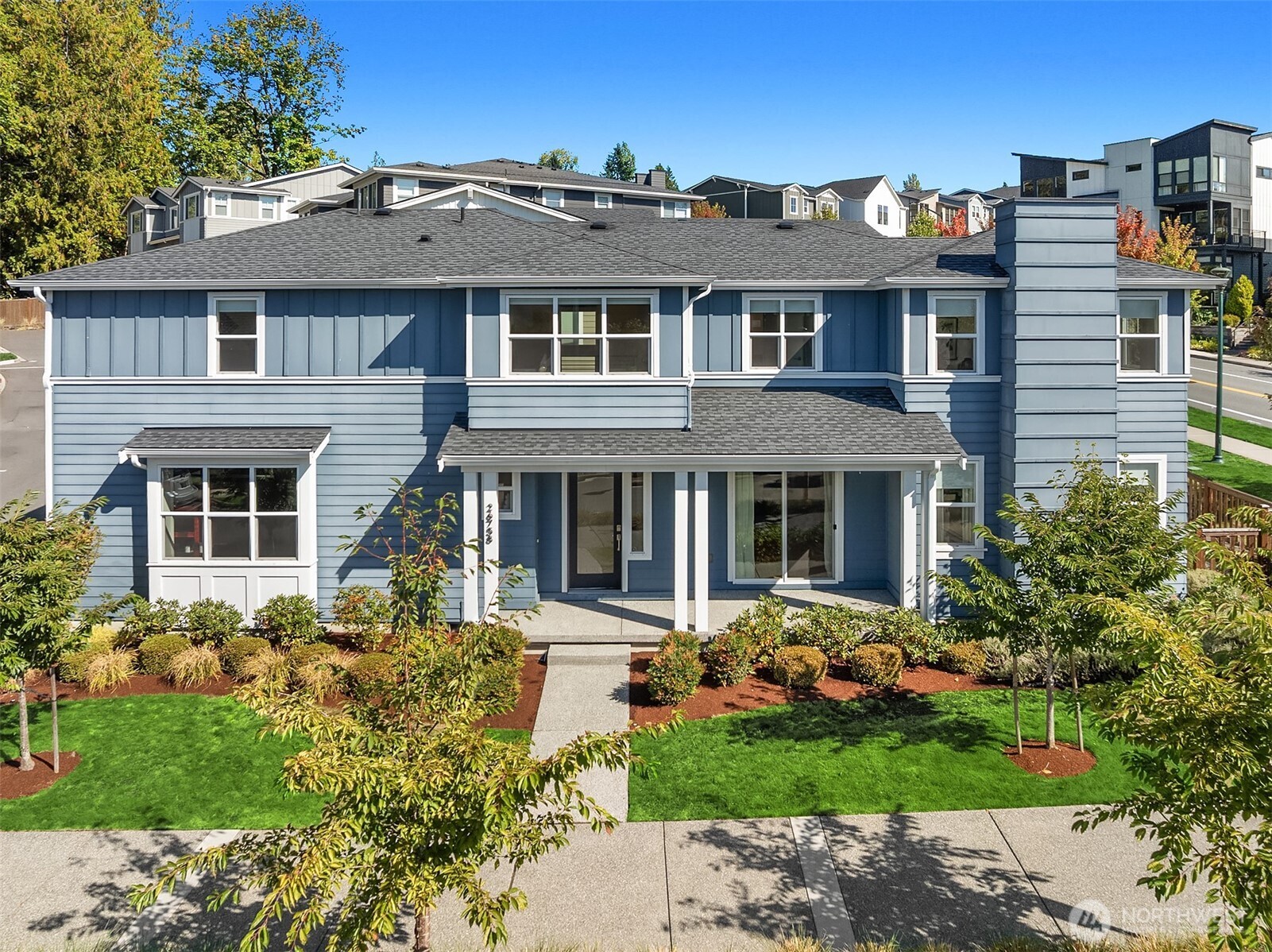 front view of a house with a yard
