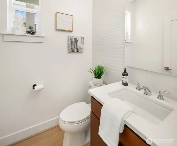 a bathroom with a sink and a toilet
