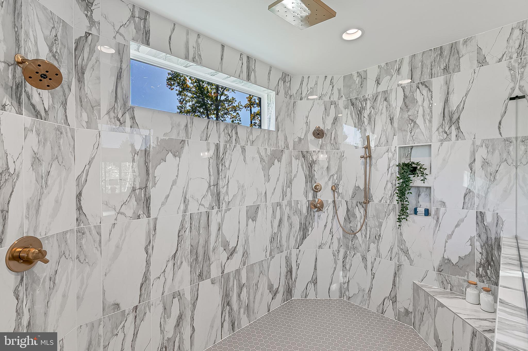 9205 Franks Point Lane Lorton, VA 22079 - Photo 16 of 26 a bathroom with a shower curtain