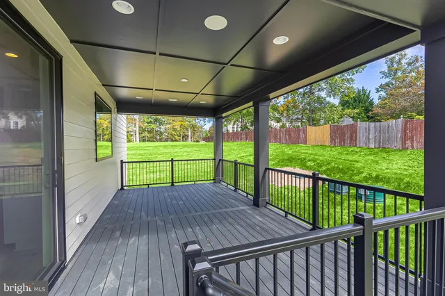 a view of a porch and garden