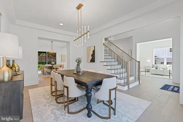 a view of a livingroom with furniture and a table