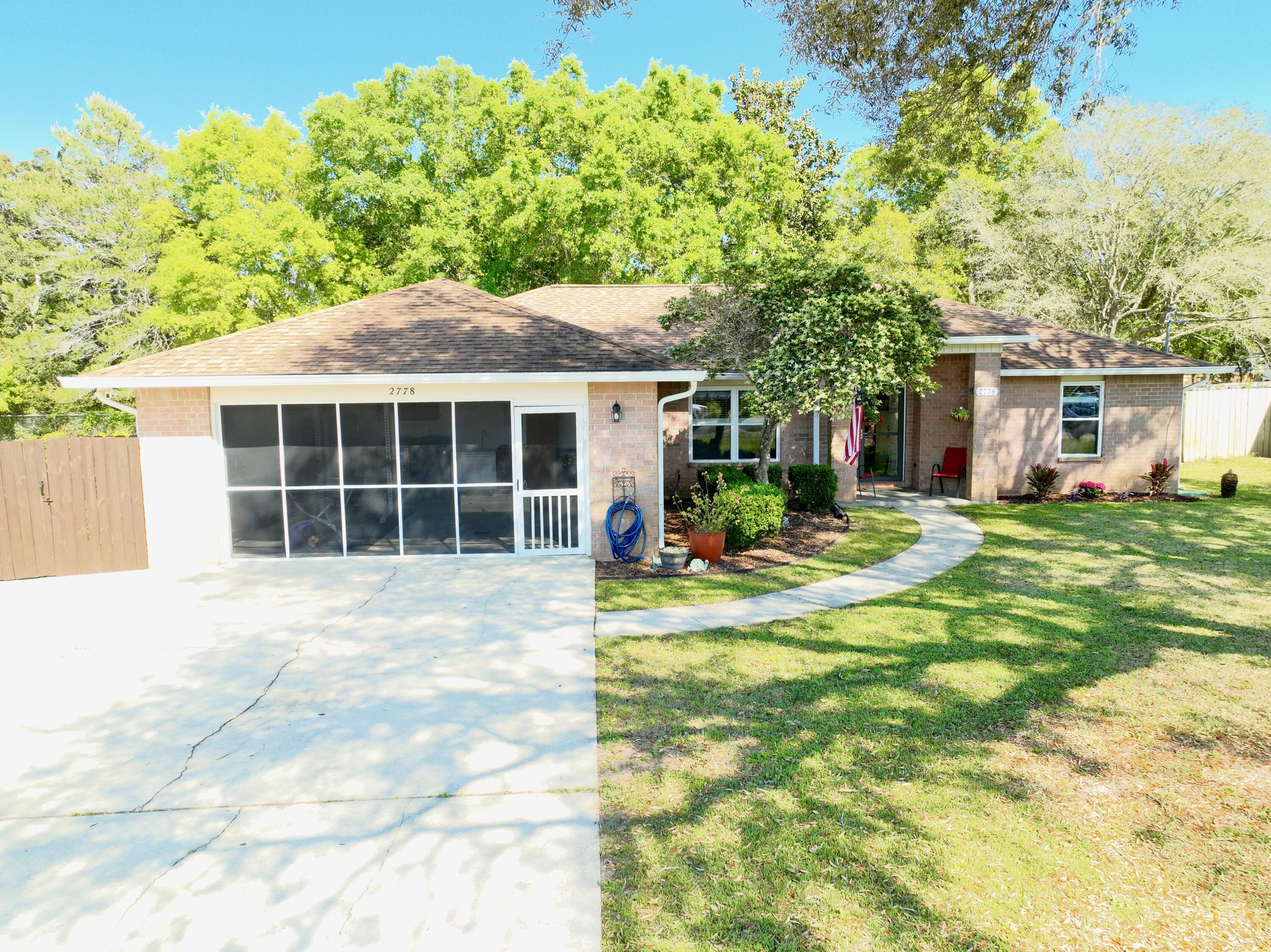 2778 Riverside Landing Drive Navarre, FL 32566 - Photo 3 of 62 dji_fly_20250412_152822_444_174458691739
