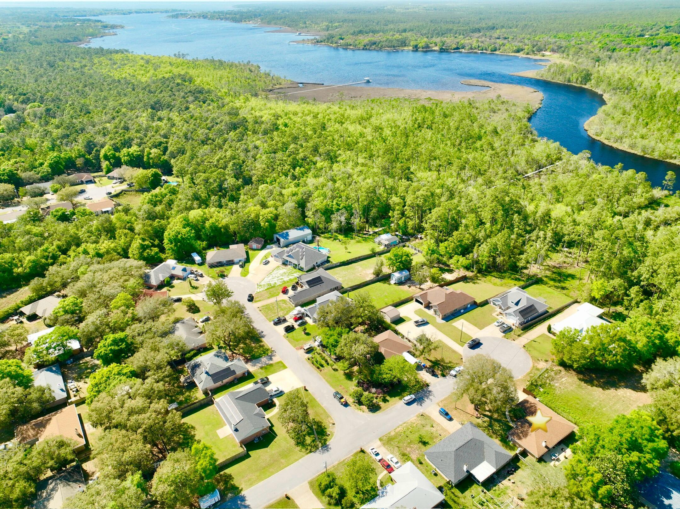 2778 Riverside Landing Drive Navarre, FL 32566 - Photo 47 of 62 dji_fly_20250412_153406_458_174458690780