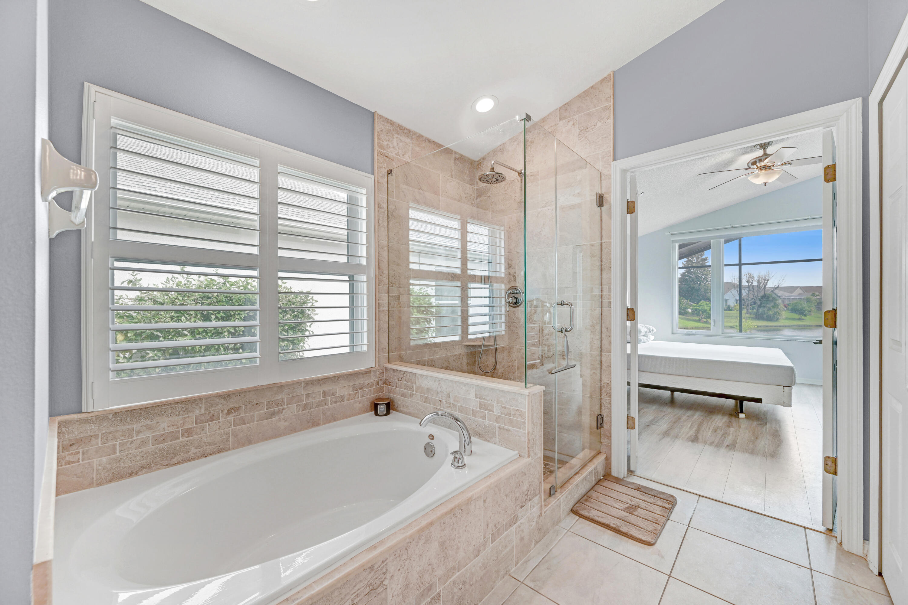 897 Shaw Circle Melbourne, FL 32940 - Photo 14 of 57 a bathroom with a bathtub a toilet and a shower