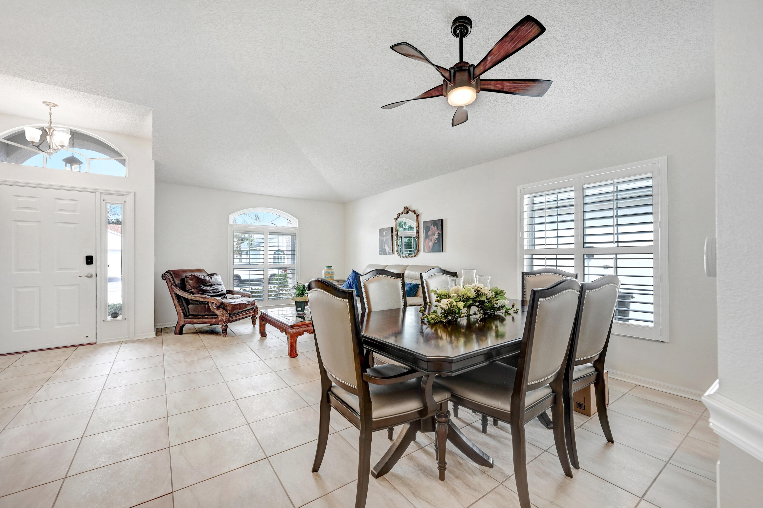 897 Shaw Circle Melbourne, FL 32940 - Photo 33 of 57 a dining room with furniture and window