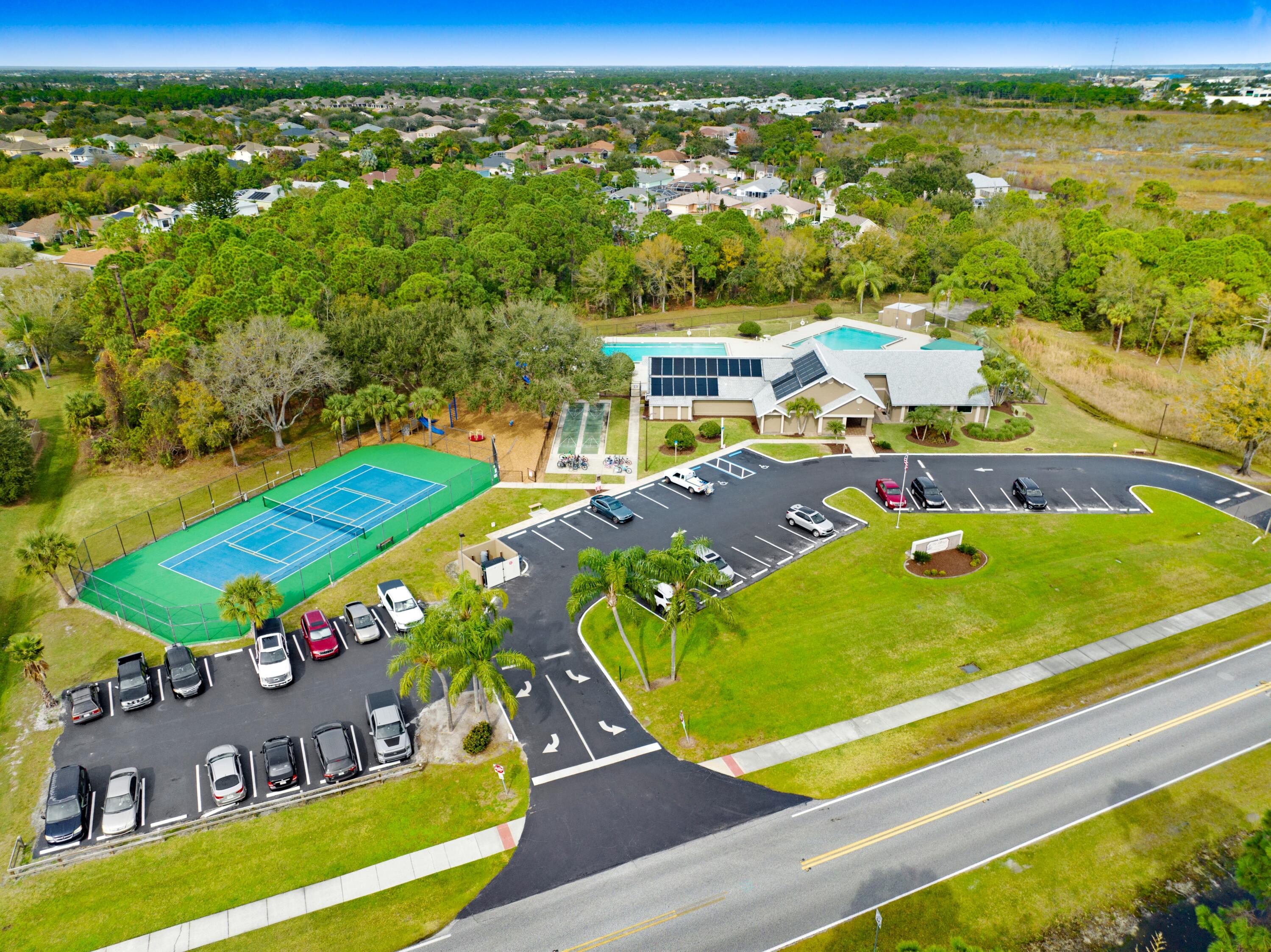 897 Shaw Circle Melbourne, FL 32940 - Photo 34 of 57 an aerial view of a pool patio and mountain view