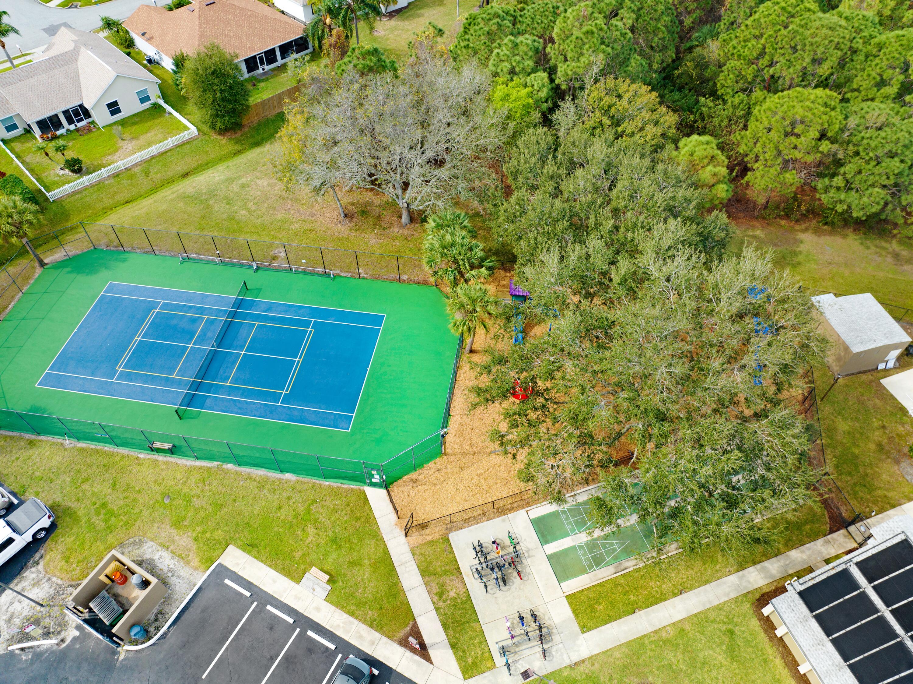 897 Shaw Circle Melbourne, FL 32940 - Photo 36 of 57 a view of a yard with furniture