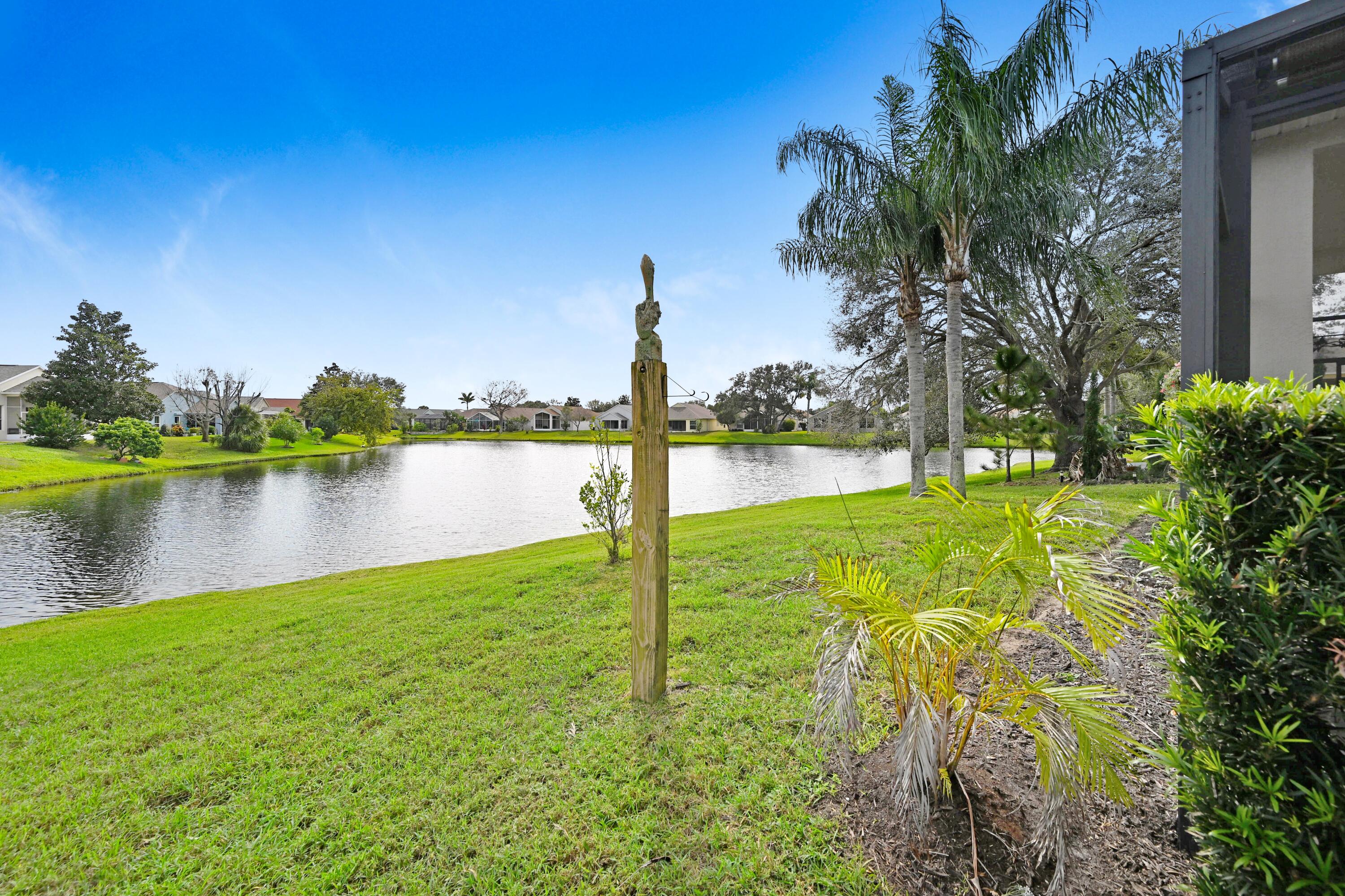 897 Shaw Circle Melbourne, FL 32940 - Photo 44 of 57 a view of a garden with houses in a back