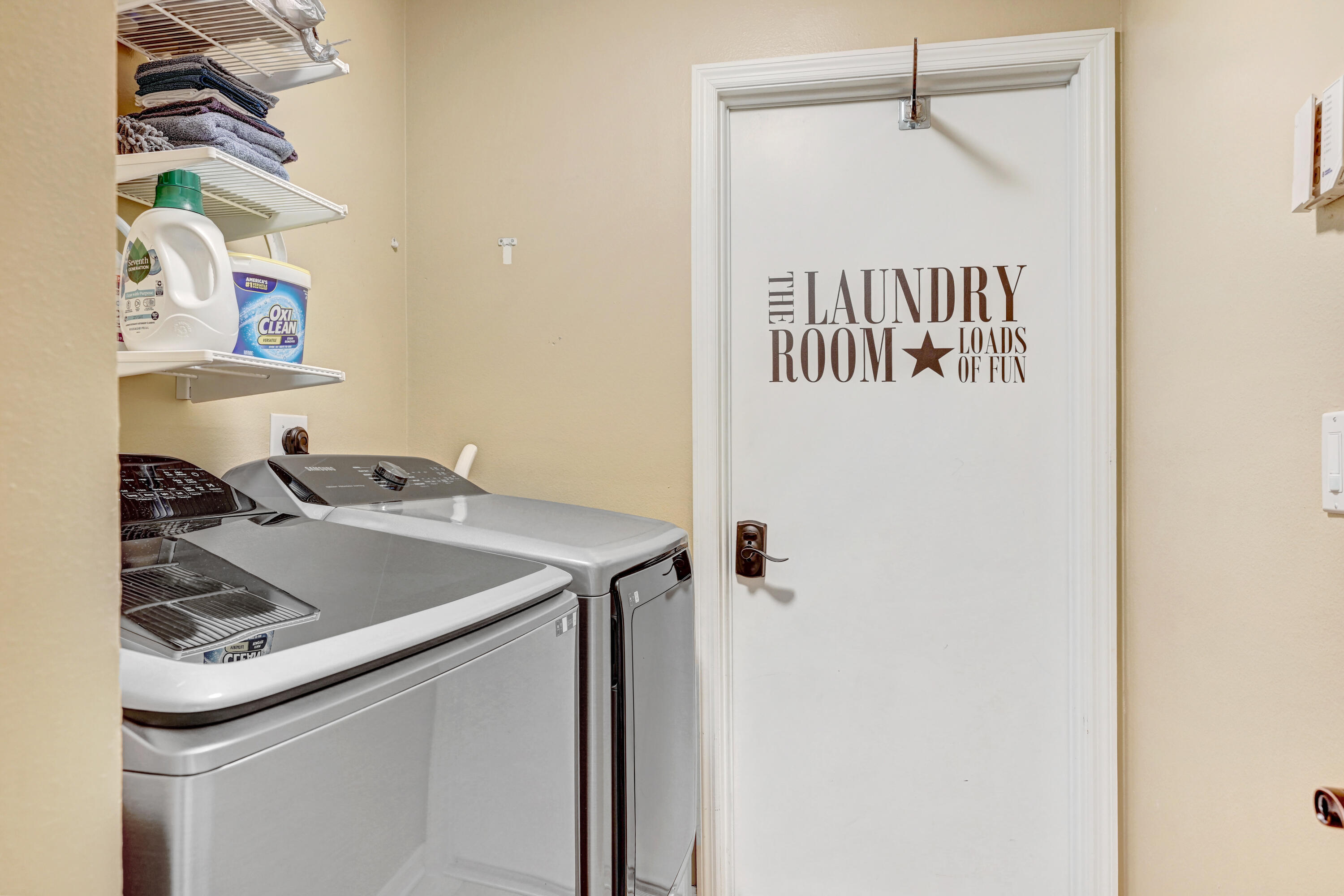 897 Shaw Circle Melbourne, FL 32940 - Photo 48 of 57 a utility room with a sink dryer and washer