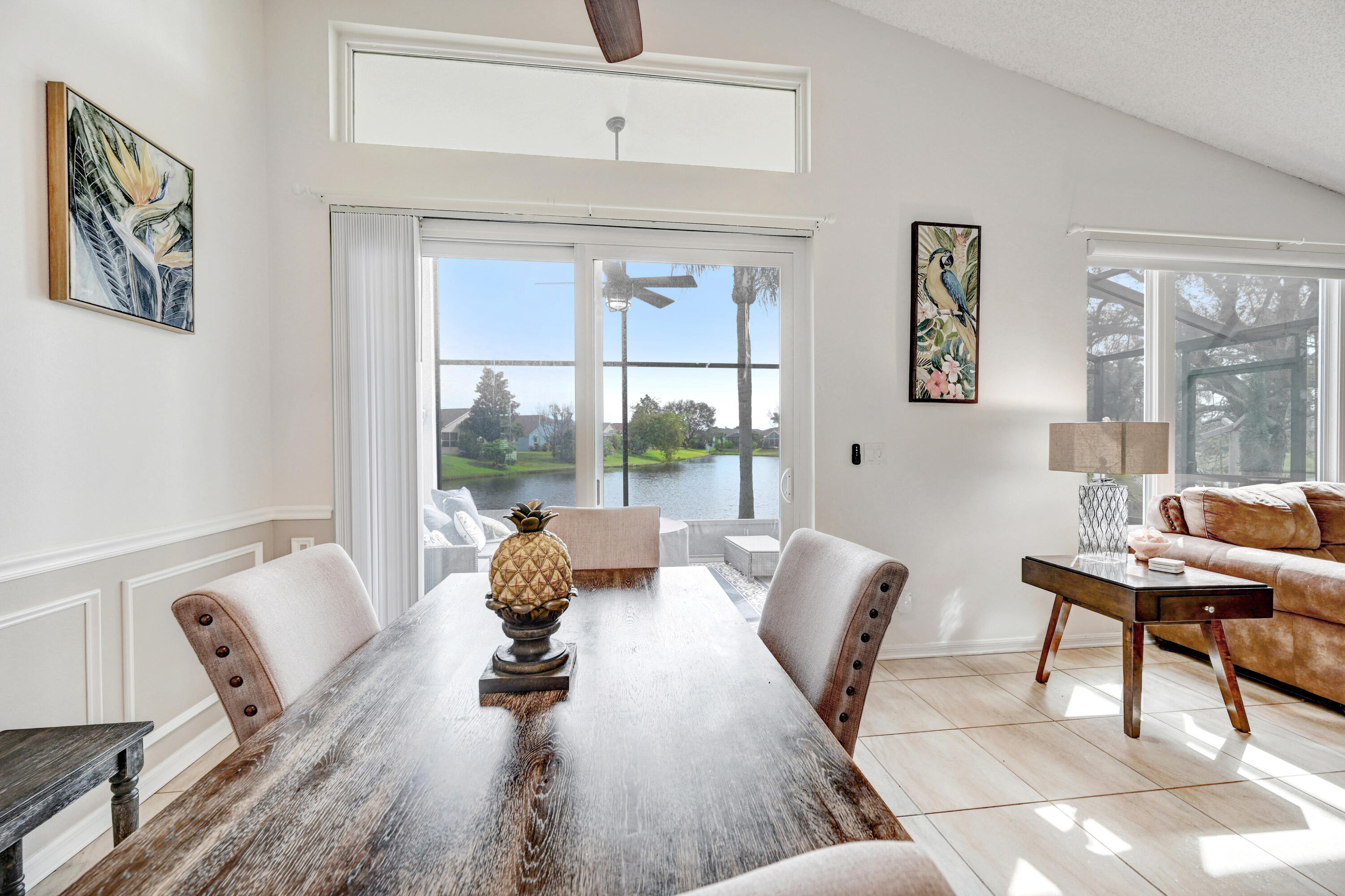 897 Shaw Circle Melbourne, FL 32940 - Photo 6 of 57 a living room with furniture and large windows