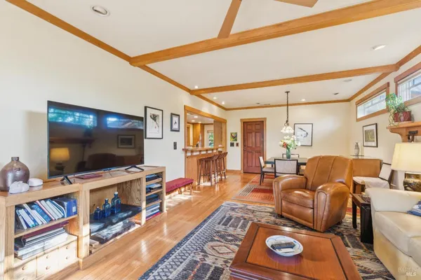 a living room with furniture and a window