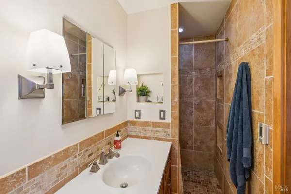 a view of a chairs and table in the patio