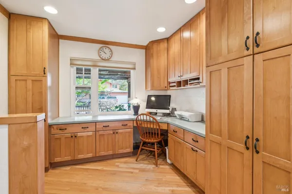 a view of a dining room with furniture window and outside view
