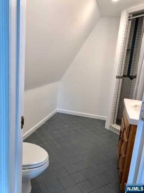 21 Columbus Street Bloomfield, NJ 07003 - Photo 12 of 20 a bathroom with a sink and toilet