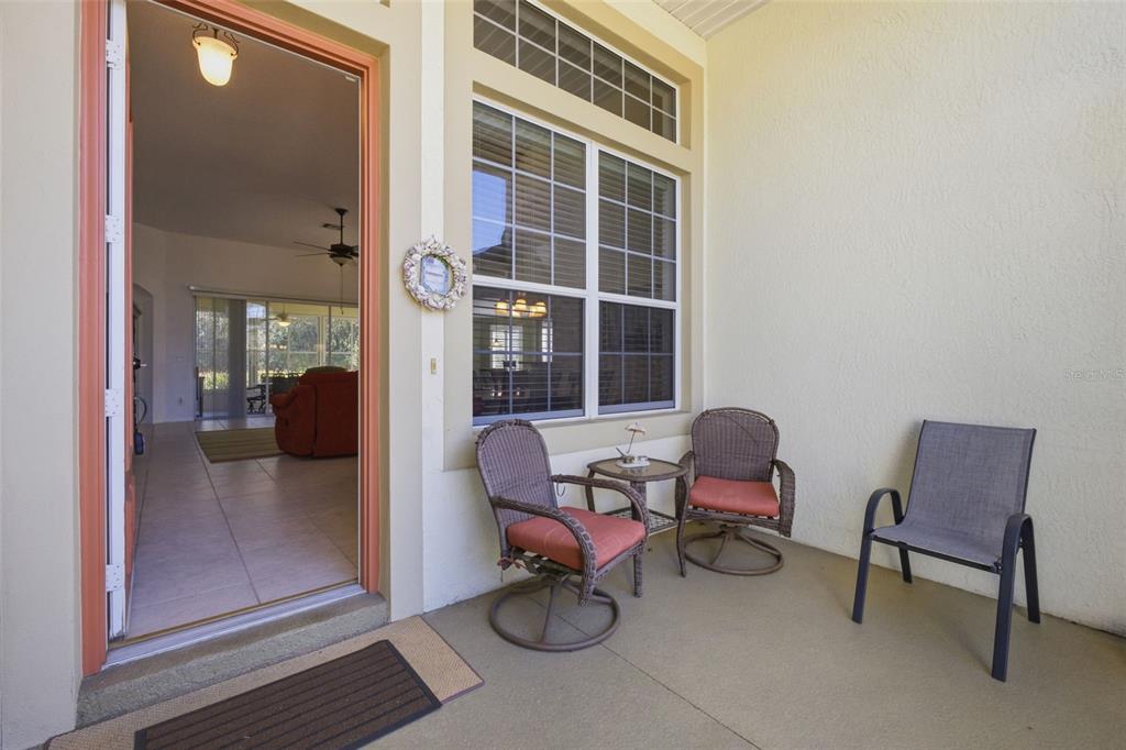 5922 Sage Leaf Place Leesburg, FL 34748 - Photo 3 of 39 a view of a livingroom with furniture and windows