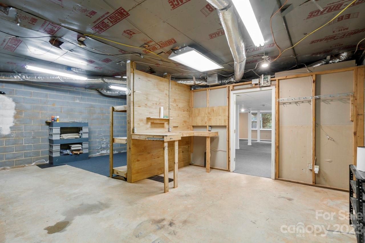 112 Walnut Street Lowell, NC 28098 - Photo 3 of 27 a view of a storage room
