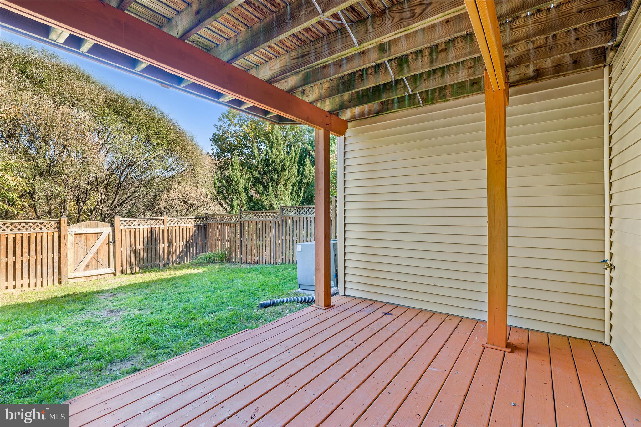 2442 Rippling Brook Road Frederick, MD 21701 - Photo 52 of 85 a view of a backyard with wooden floor