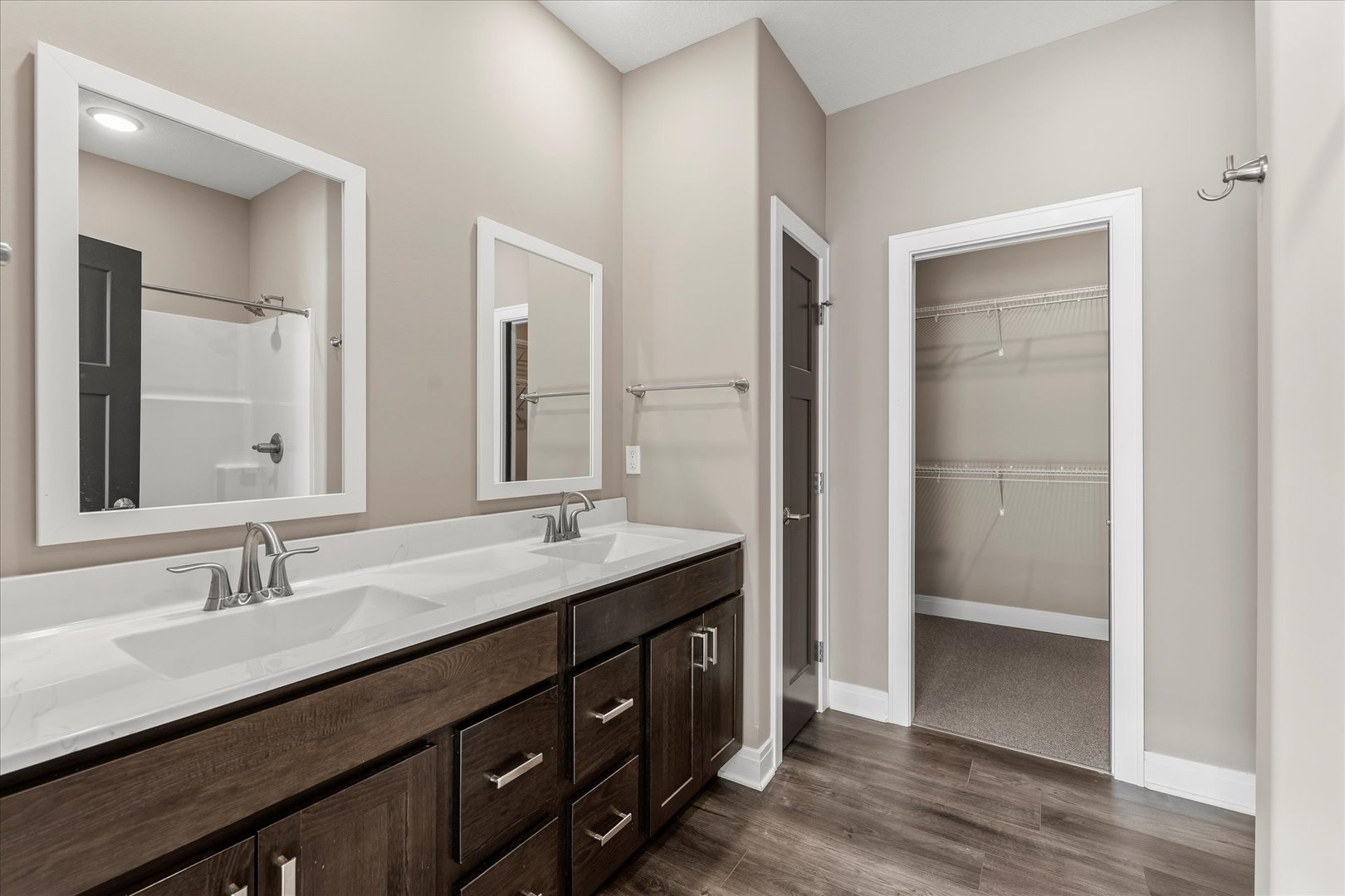 3411 Boulder Ridge Drive Champaign, IL 61822 - Photo 20 of 36 a bathroom with a double vanity sink and mirror