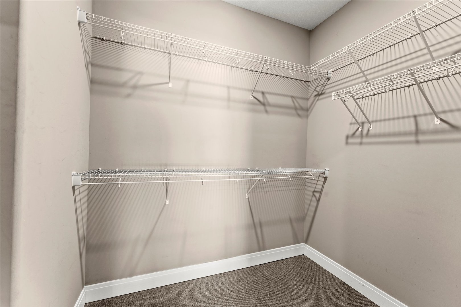 3411 Boulder Ridge Drive Champaign, IL 61822 - Photo 22 of 36 a view of a room with racks on the wall