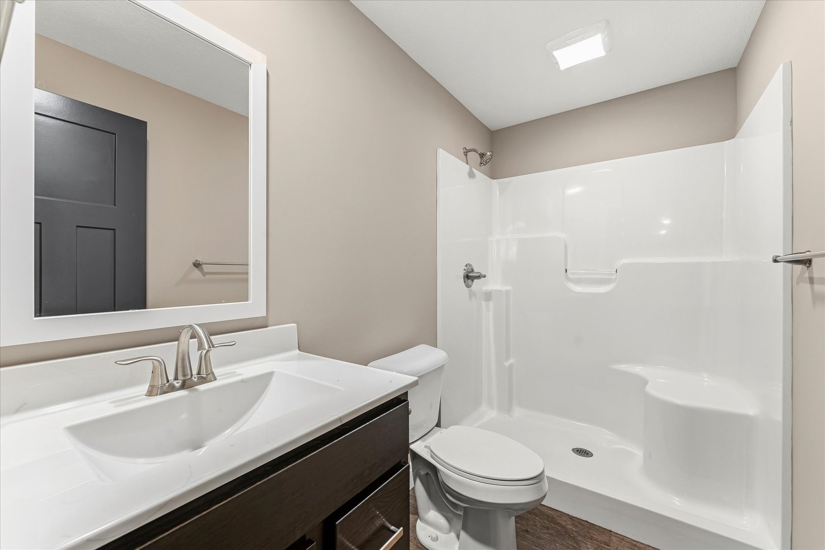 3411 Boulder Ridge Drive Champaign, IL 61822 - Photo 29 of 36 a bathroom with a sink a toilet and shower