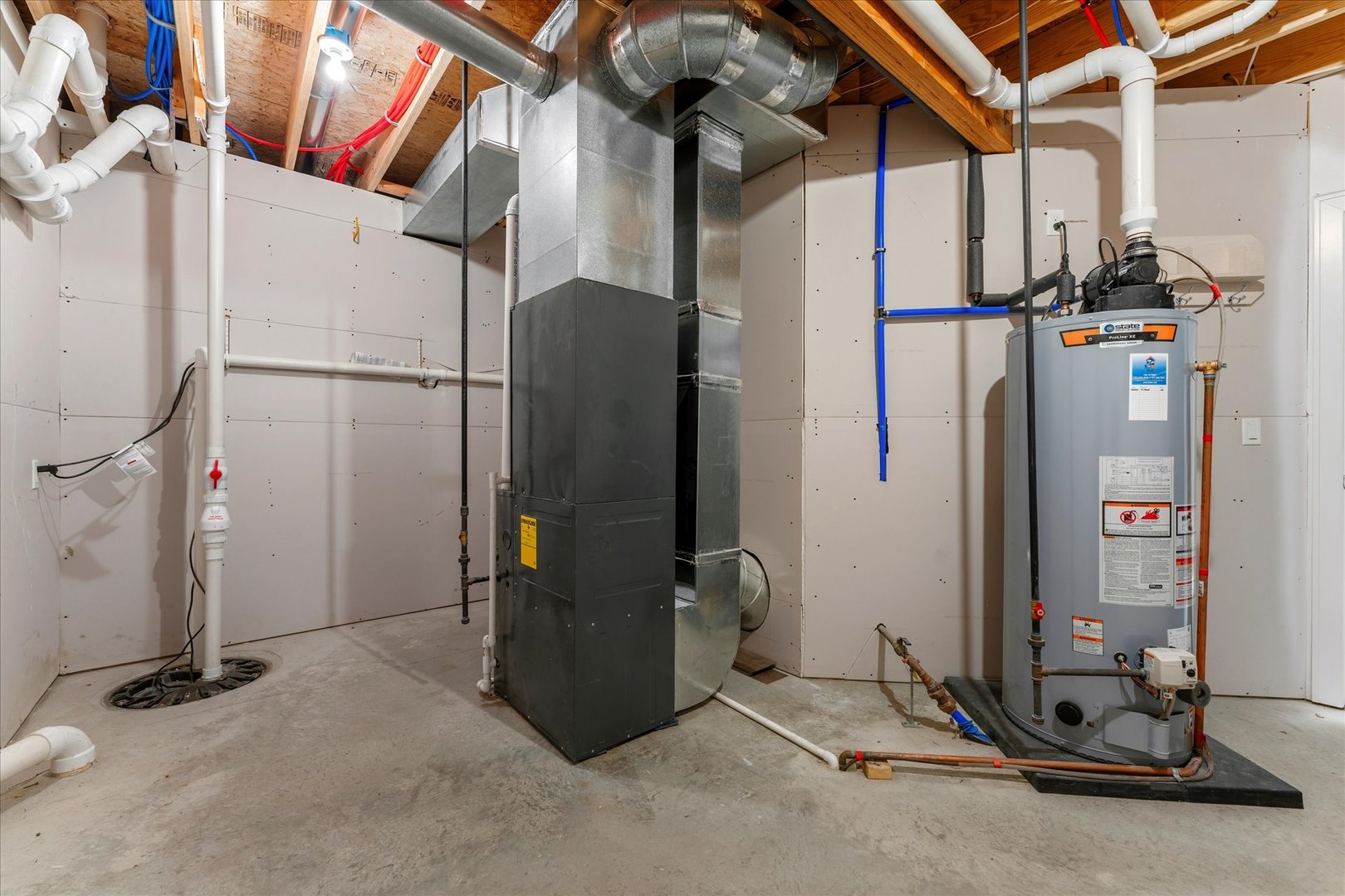 3411 Boulder Ridge Drive Champaign, IL 61822 - Photo 31 of 36 a view of walk in closet with clothes and shoes