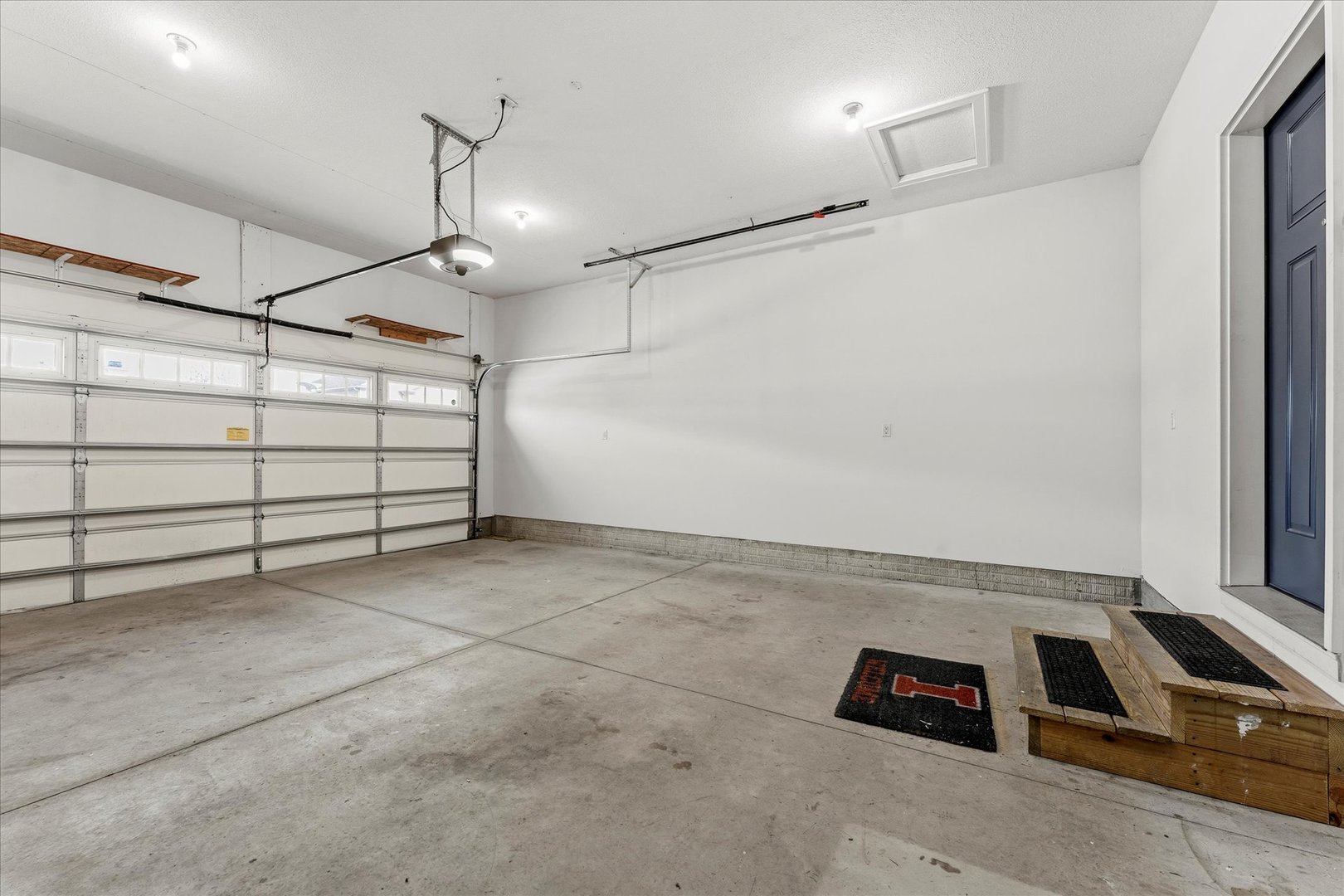 3411 Boulder Ridge Drive Champaign, IL 61822 - Photo 32 of 36 a view of a garage with lots of stuff