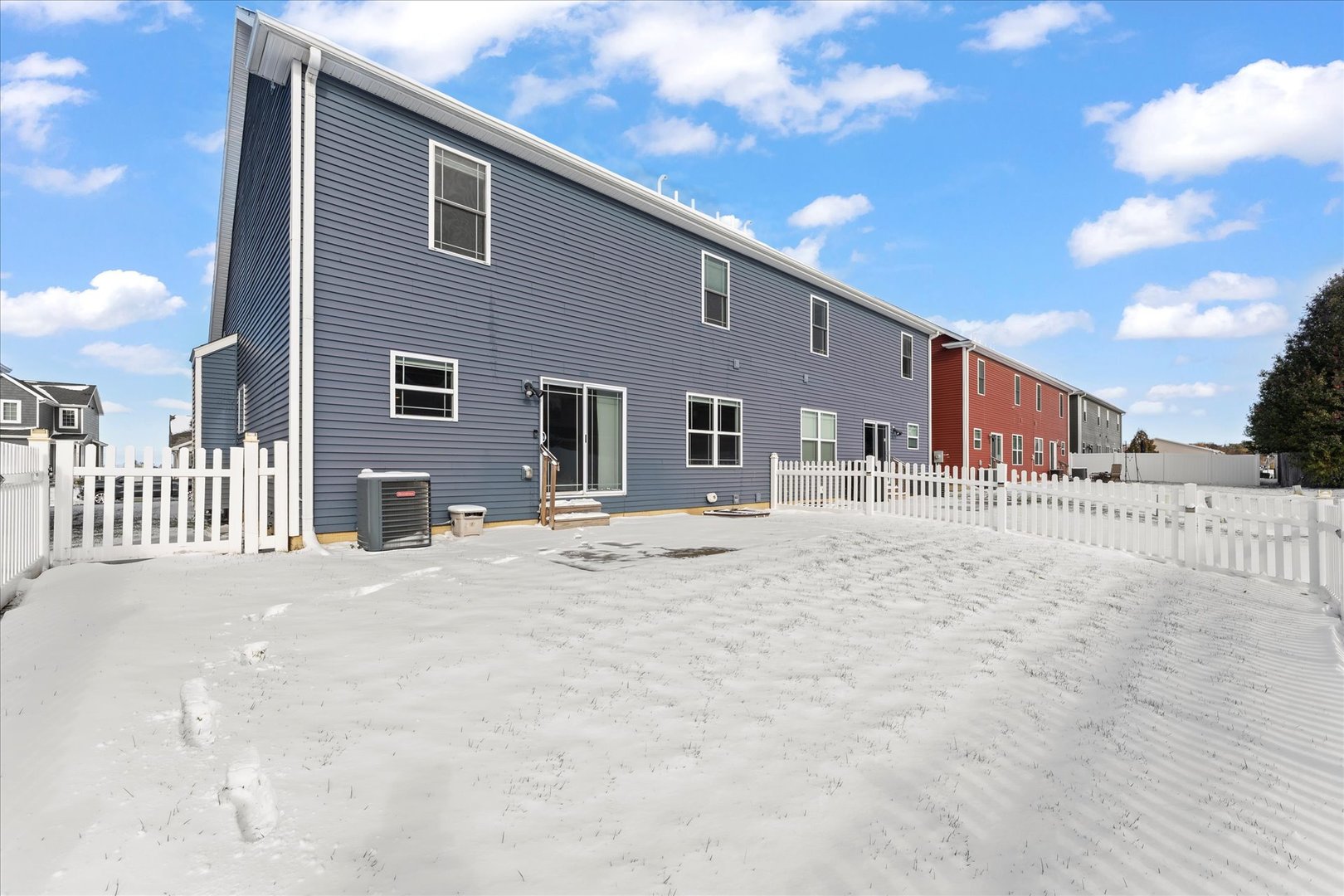 3411 Boulder Ridge Drive Champaign, IL 61822 - Photo 33 of 36 a view of a house with a patio