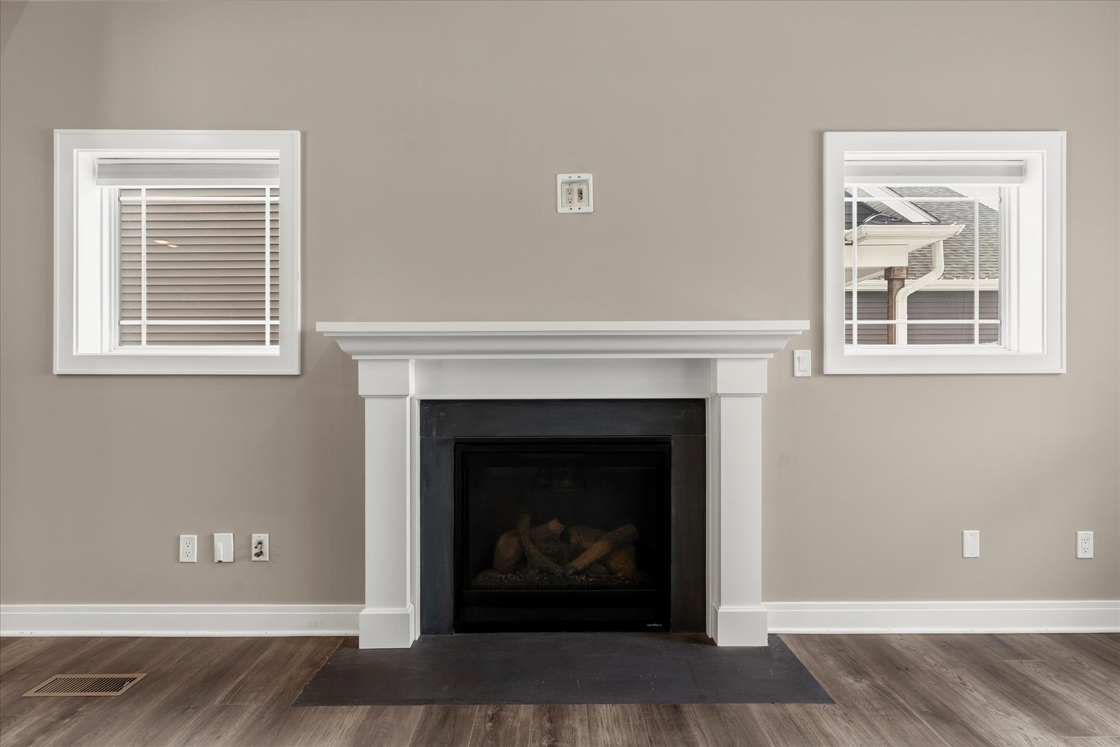 3411 Boulder Ridge Drive Champaign, IL 61822 - Photo 6 of 36 a living room with a fireplace