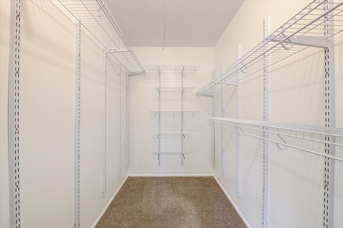 1110 Scanlon Drive, Unit D1 Wheeling, IL 60090 - Photo 16 of 23 a view of a room with white walls