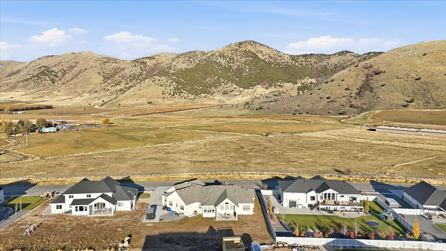 534 East Fish Hatchery Road Mantua, UT 84324 - Photo 81 of 87 Aerial view of residential area with a mountainous background