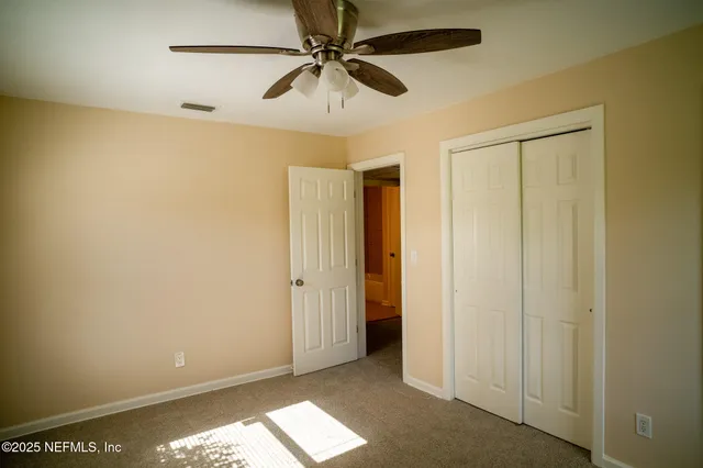 a bathroom with a toilet and a sink
