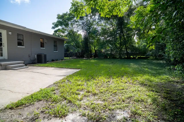 a view of balcony with wooden floor