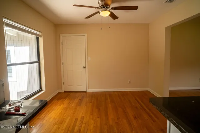 an empty room with windows