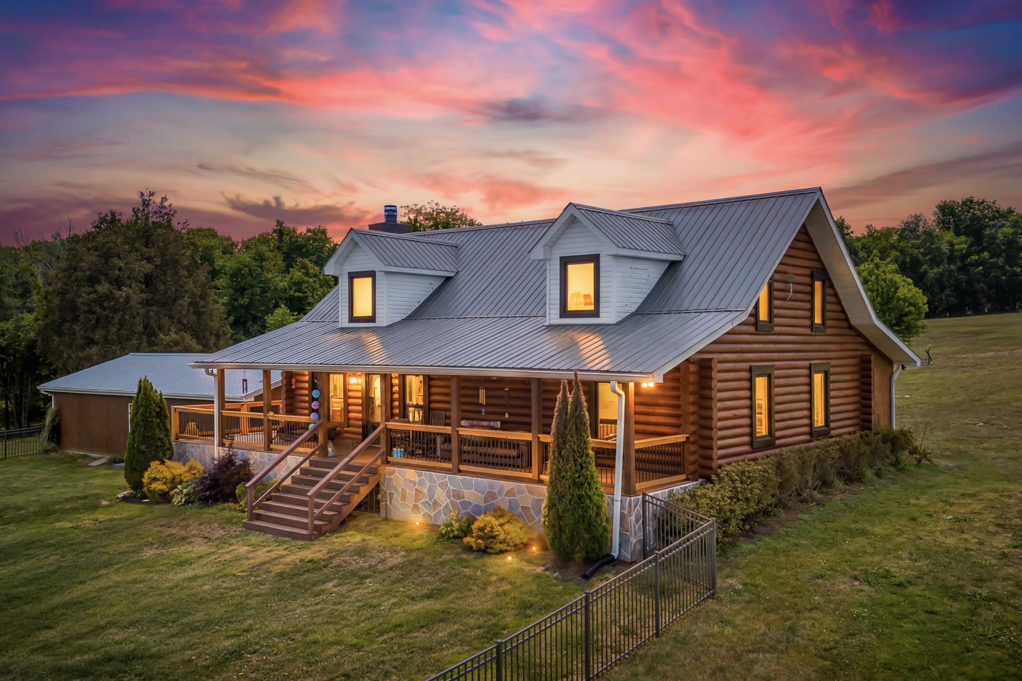 642 Beach Bottom Road Watertown, TN 37184 - Photo 1 of 48 a front view of a house with garden