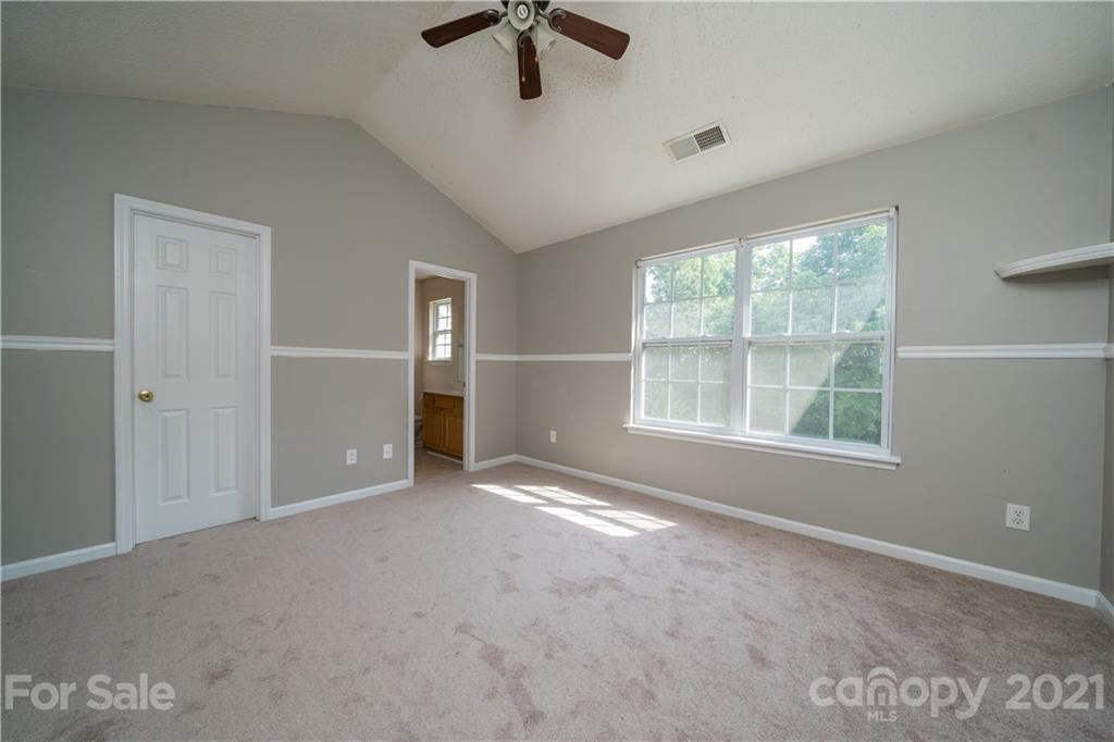 11329 Stone Trail Road Charlotte, NC 28213 - Photo 18 of 23 a view of an empty room with a window