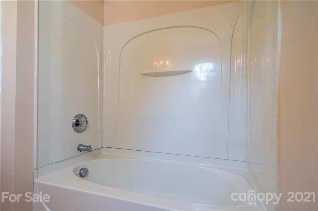 11329 Stone Trail Road Charlotte, NC 28213 - Photo 21 of 23 a bathroom with a bathtub