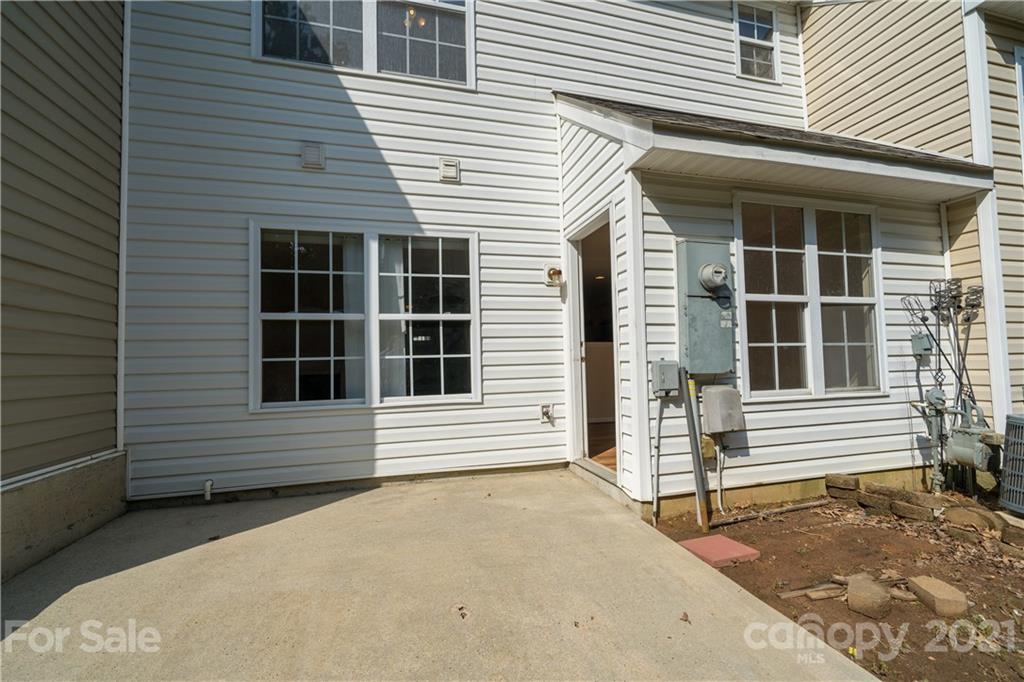 11329 Stone Trail Road Charlotte, NC 28213 - Photo 23 of 23 a view of a house with white door and a large window